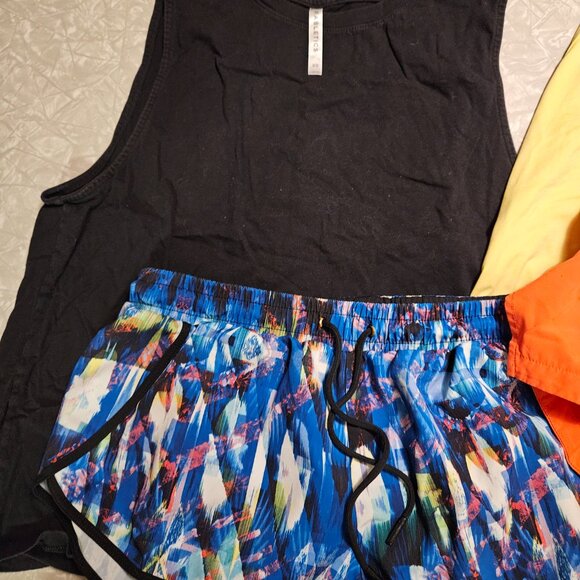 Fabletics XS bundle! Two tanks (muscle/open-back) and two shorts! - Picture 2 of 13